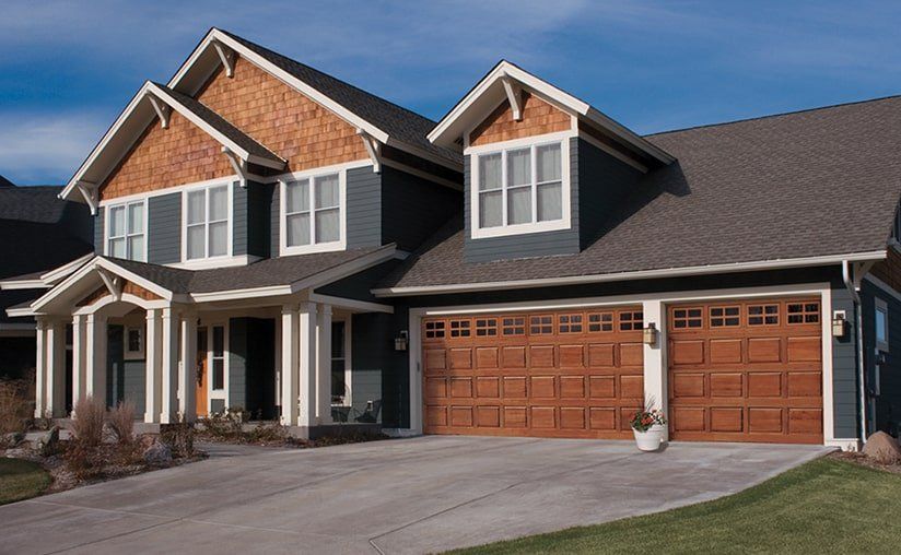 classic-wood-design-short-stockton-window-cedar-garage-door-4bd7cd6b-1920w.jpeg